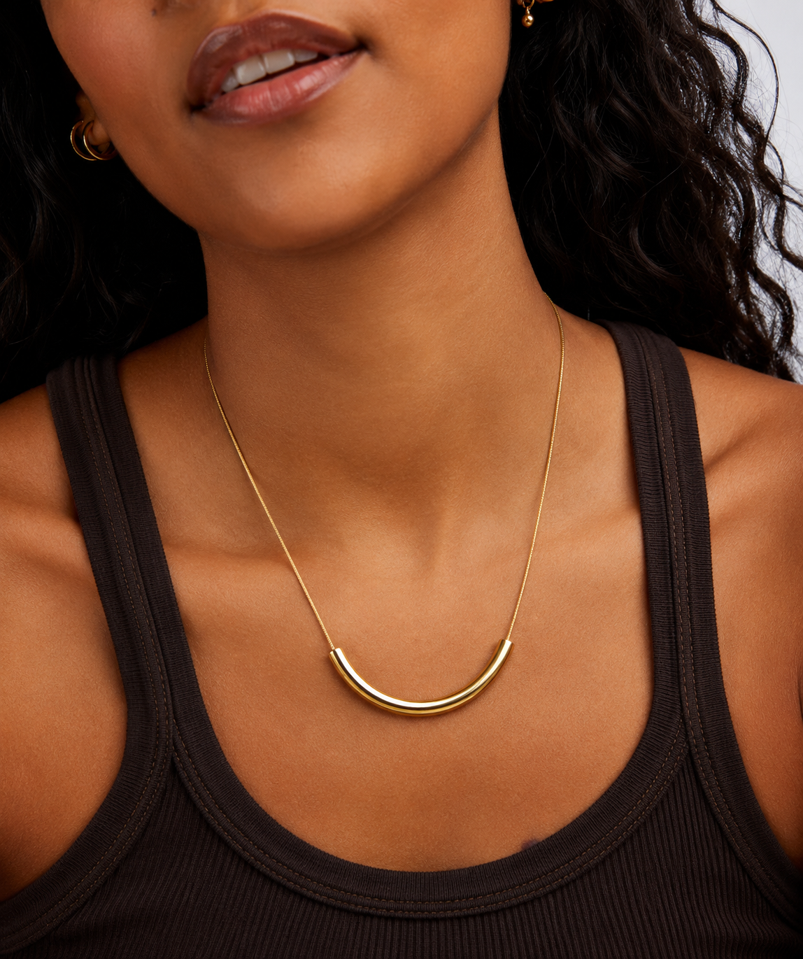 Gold spine bar necklace by Arden luxe in Kenya